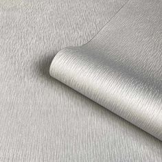 a plain silver fabric with metallic foil on it