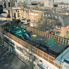 an aerial view of a playground in the city