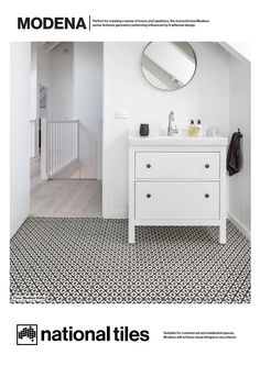 a white bathroom with black and white tile on the floor is featured in moderna magazine