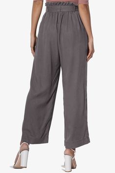 Upgrade your look with chic culotte pants, styled with an detachable tie belt and elastic paperbag waist. A high-waist hits just right and falls into a wide leg crop fit. Pair these with the Crop Top for full effect.Tencel woven, high rise with paperbag pleats, Pull onElasticized waist, Detachable sash tie beltWide leg, cropped length, side slant pocketsSize Guide : Fits true to size, take your normal size(S=1-3, M=5-7, L=9-11)Model size : 5'3" height, 34" bust, 24" waist, 34" hip, Normally wear Trendy Solid Bottoms With Tie Waist, Chic Solid Color Culottes With Loosely Fitted Hips, Versatile Belted Wide Leg Pants, Casual Wide Leg Pants With Tie Waist, Chic Paperbag Waist Bottoms With Tie, Spring Solid Wide Leg Pants With Tie Waist, Relaxed Fit Wide Leg Pants With Tie Waist, Belted Wide Leg Pants For Spring, Wide Leg Pants With Tie Waist For Daywear