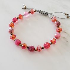 It Fits Wrist Between 6"- 7.5". It's Made Of 8mm Pink Agate, 8mm Swarovski Red Bead And 3mm Gold Stone Bead. Large Cuff Bracelet, Tanzanite Bracelet, Gold Pearl Bracelet, Handmade Crystal Jewelry, Friendship Bracelets With Beads, Turquoise Bracelet Cuff, Pink Agate, Glass Bracelet, Bracelets Handmade Beaded