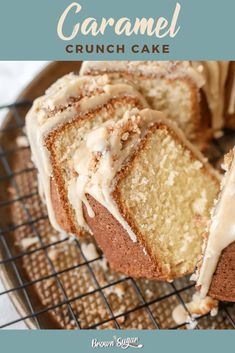 a close up of a cake with icing on a cooling rack and the words caramel crunch cake above it