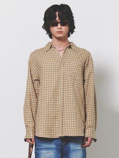 This is a comfortable and casual shirt made out of Japanese premium Ueyama checkered fabric. With minimal design detail including the trendy oversized silhouette, pleats detail on the center back, and 4 color thread checkered pattern, it gives a trendy and casual look. - Oversized silhouette- Pleat detail on the center back- 4 Color checkered pattern Classic Plaid Tops For Casual Gatherings, Classic Plaid Shirt For Casual Gatherings, Fall Cotton Shirt With Grid Pattern, Oversized Plaid Tops For Work, Casual Long Sleeve Top With Grid Pattern, Oversized Plaid Tops For Everyday, Casual Tops With Grid Pattern For Fall, Gingham Long Sleeve Tops For Everyday, Everyday Gingham Long Sleeve Tops