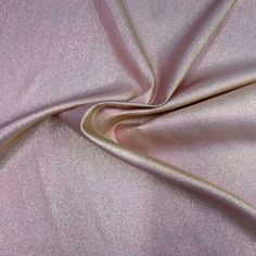 a close up shot of a pink fabric