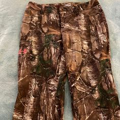 a pair of brown pants with trees on them