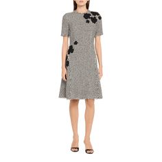 Rickie Freeman for Teri Jon tweed midi dress with fringe trim and beaded floral appliqué Approx. 40"L from shoulders to hem Jewel neckline Short sleeves Hem hits around the knee A-line silhouette Invisible back zipper Polyester Lining: Polyester Dry clean Imported Elegant Embellished Tweed Dress For Spring, Spring Evening Tweed Dress With Short Sleeves, Knee-length Tweed Midi Dress For Work, Spring Tweed Dresses For Work, Spring Wool Tweed Dress Fitted, Spring Fitted Wool Tweed Dress, Tweed Dresses For Spring Workwear, Knee-length Tweed Dress For Evening, Spring Wool Tweed Fitted Dress