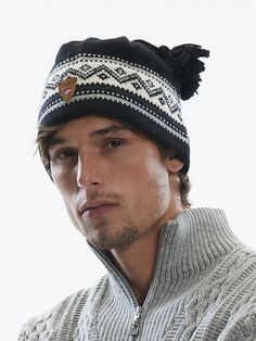 The Vail hat features traditional Norwegian patterns with tassels for a classic winter sports look. It is knitted with 100% long-lasting Norwegian wool and lined with skin-soft, itch-free merino wool for extra comfort. The design is inspired by our official 2007 U.S. Alpine and Snowboard Team sweater, the Vail sweater.


Unisex fit, one size


100% long-lasting Norwegian wool, half-lined with 100% extra-fine merino wool


Designed and knitted in Norway


Hand wash


Matching Vail sweater and win Sports Look, Wool Accessories, Dale Of Norway, Winter Sports, Hat Hairstyles, Black Design, Hair Pieces, Sweater Shop, Norway