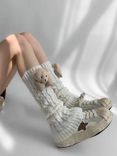 Embrace the kawaii fashion trend with these irresistibly cute knit leg warmers, embellished with charming teddy decorations. Available in three versatile colors—Khaki, Coffee, and White—these leg warmers are the perfect blend of style and comfort. Garment SizeSizeFree SizeFull Length40.5Cuff16/18 Trendy Cream Socks For Winter, Casual White Knitted Socks, Trendy Cream Winter Socks, Cute White Leg Warmers For Fall, Casual Beige Knitted Leg Warmers, Casual Chunky Knit Leg Warmers, Cute Leg Warmer Outfits, Shoes With Leg Warmers, Legwarmers Aesthetic