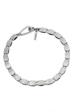 This flat chain bracelet brings modern finesse to everyday ensembles. 7 1/2" length; 1/4" width Silvertone plate Imported Modern Jubilee Bracelet With Chain Link, Modern Silver Chain Bracelet With Rectangular Links, Modern Bracelets With Box Chain And Chain Link, Modern Bracelet With Adjustable Chain And Rectangular Links, Modern Sterling Silver Chain Bracelet For Formal Occasions, Modern Sterling Silver Jubilee Bracelet With Rectangular Links, Modern Silver Chain Bracelet, Modern Formal Bracelet With Adjustable Chain, Modern Formal Chain Bracelet With Adjustable Chain