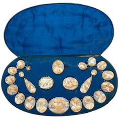 For Sale on 1stDibs - An impressive shell cameo parure comprised of necklace, earrings (day-to-night with removable drops), brooch, and 2 bracelet panels (for stitching onto Yellow Gold Cuff Bracelet, Brooch Display, Antique Ring Settings, Retro Bracelet, Display Jewelry, Antique Fashion, Image Bank, Vintage Fine Jewelry, Cameo Jewelry