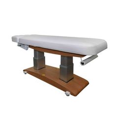 Elevate Your Spa ExperienceIndulge in the ultimate blend of luxury and functionality with the Woody Pedestal 2259+ Electric Massage and Spa Table by Silver Fox, meticulously designed for high-end spas, medical esthetics, and massage therapy centers.Crafted for those who prioritize both aesthetics and stability, this spa table stands out with its robust dual pedestal base. The added strength of this design ensures that the table stays unwavering, even during intensive treatments where firm pressu Medical Esthetics, Spa Table, Spa Bed, Spa Luxe, Spa Interior, Table Sizes, Silver Fox, Massage Therapy, Wood Paneling