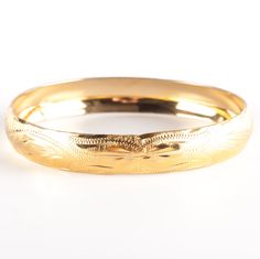 Vintage 1930's 14k Yellow Gold Etched Style Bangle Bracelet 18.1g 8" LengthMetal Information: 14k Yellow GoldTotal Weight: 18.1gWidth: 11.2mmLength: 8"Circa: 1930'sEstimated Retail Price: $2940.00OUR PRICE: $2350.0044505 Classic Yellow Gold Band Bracelet, Heirloom Style Polished Gold Bangle, Classic Bracelets With Decorative Band For Formal Occasions, Classic Gold Band Bracelet, Elegant 14k Gold Bracelets With Decorative Band, Classic Formal Bracelets With Decorative Band, Formal 14k Gold Bracelet, Heirloom 14k Gold Round Bracelets, Elegant Yellow Gold Bracelet With Decorative Band