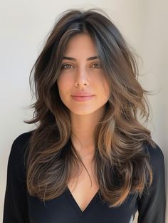 Imagine strands of rich chocolate cascading down in gentle waves, the ends dancing just above the shoulders. This medium length haircut with layers wavy is the epitome of effortless elegance. The layers are cut with precision to enhance the hair’s natural movement, creating a lively bounce with each step. Ideal for those with natural waves, this style is also a perfect canvas for curtain bangs, adding a touch of softness to frame the face. It speaks to the straight hair trending hairstyles of 2024, bringing a cute and dynamic vibe to the classic medium length. Courtney Grow Hair, Soft Layers Medium Hair Round Faces, Hairdo Ideas, Quick Curls, Haircuts For Long Hair With Layers, Haircuts For Medium Length Hair, Hair Inspiration Long, Layered Haircuts For Medium Hair, Wavy Haircuts