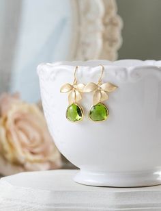 Peridot Green Earrings, August Birthstone Jewelry, August Birthday Gift, Gold Orchid Flower Earrings Green Wedding Earrings, Bridesmaif gift Elegant Green Earrings For Mother's Day, Elegant Green Flower Earrings For Gift, Green Flower Earrings For Wedding, Delicate Birthstone Earrings For Wedding, Wedding Jewelry With May Birthstone In Flower Shape, Elegant Green Flower Earrings For Wedding, Elegant Flower Shaped Crystal Earrings As Gift, Green Flower Wedding Earrings, Green Round Flower Earrings For Wedding