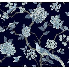 a blue and white wallpaper with flowers and birds on the branches, in front of a dark background