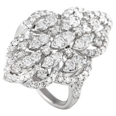 Whether worn as a cocktail ring or a dinner ring, this precious sparkler is bound to make a statement. This diamond ring is crafted in 14K white gold and has a 1mm-thick band. Offering a bold contrast to the slim shank is an 18mm by 28mm top, encrusted with diamonds on a vintage-inspired pattern.This brand-new 14K White Gold 1.50ct Diamond Vintage-Style Ring comes in a gift box. Dinner Ring, Vintage Style Rings, Vintage Diamond, Cocktail Ring, Cocktail Rings, Vintage Stil, Diamond White, Style Vintage, Band Rings