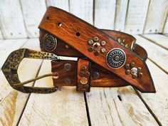 Welcome to our Etsy shop! This exquisite handmade light brown leather belt is a true testament to the craftsmanship of Ishaor. With its unique design, this belt captures the essence of the Western style, adding a touch of rugged charm to any outfit. Adorned with meticulously placed gold and silver rivets, this belt truly stands out from the rest. The combination of these elegant embellishments with the addition of silver coins creates a stunning visual appeal that sets this belt apart from tradi Handmade Belts, Light Brown Leather, Belt Design, Design Light, Brown Leather Belt, Brown Belt, Silver Coin, Nice Leather, Leather Belts