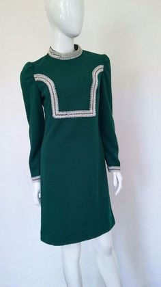 Classic 70's  DressEmerald green polyester material with white lace detailings.Size MediumExcellent ConditionZip backEmail for specific measurements 70's Dress, Dress Emerald Green, Emerald Green Dress, Snakeskin Boots, Emerald Green Dresses, Vintage Biker, 70s Dress, Biker Leather, Powder Pink