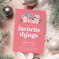 a pink card with the words favorite things on it next to christmas ornaments and decorations