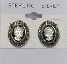 "Offering a pair of 925 silver mother of pearl onyx and marcasite earrings. The earrings measure 1\" x 1/2\". All my jewelry items are purchased through auctions or sales. Please see pictures. This is what you will receive. Thank you!" Silver Cameo Earrings As A Gift, Marcasite Earrings, My Jewelry, Jewelry Earrings Hoops, Flower Pendant, Flower Brooch, Heart Necklace, Mother Of Pearl, Necklaces Bracelets