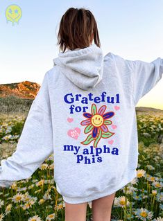 Soft, cute, and trendy, this Alpha Phi hoodie will quickly become your go-to cozy sweatshirt! Use the drop down to specify preference between white, ash, gold, irish green, light blue, carolina blue, or light pink. LISTING IS FOR ALPHA PHI. Please be sure you are ordering for your correct Sorority.  We print on high quality, soft, & heavyweight materials, sustainably made and printed in the US. ♥ SIZING ♥ Unisex Sizing- For a more feminine, fitted look we recommend getting your size. For a more oversized look, we recommend sizing up. ♥ SHIP TIME ♥ Items may take up to 7 business days to process before shipping. Shipping time is (on average) an ADDITIONAL 2-5 business days. Shipping times vary for many reasons, but is largely influenced by your location. ♥ CARE INSTRUCTIONS ♥ Wash garments Alpha Epsilon Phi, Big Gift, Sigma Delta Tau, Sorority Sweatshirts, Alpha Sigma Tau, Phi Sigma Sigma, Alpha Xi Delta, Alpha Gamma Delta, Pi Beta Phi