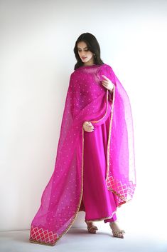 Meticulously crafted from a remarkably glamourous shade of magenta ( pure raw silk 60 gms )“ Zabe “ with its intricate hand crafted details strikes the perfect balance between elegant and eye-catching, making this beautiful design a must have. The length of the kalidaar is 48 inches.Agha Noor’s style tip - “ Dress it u Pink Raw Silk Sharara With Gota Work, Elegant Pink Traditional Wear With Pallu, Elegant Pink Anarkali Set With Dabka, Designer Pink Art Silk Sharara, Elegant Pink Anarkali Set With Dabka Details, Diwali Pink Raw Silk Sharara, Elegant Slub Silk Traditional Wear For Eid, Elegant Sharara With Gota Work For Festivals, Elegant Slub Silk Traditional Wear For Festive Occasions