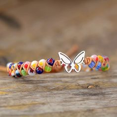 Inspire Your Beauty by the charming Nature and its Peaceful Creatures with our Butterfly Charm Colorful Beaded Bracelet   This Hand Made Butterfly Charm Colorful Beaded Bracelet is specially made for Bohemian stylish queens who are looking for a Charming Style inspired by the Magical Nature It features a Breathtaking Mix of colors Giving you the Charming Natural Inspired Beauty with its special happiness . This Bracelet is handmade with Love ; this is what makes this Bracelet unique, just l Happiness Is A Butterfly, Wrap Armband, Butterfly Charm Bracelet, Treasure Jewelry, Butterfly Bracelet, Nature Inspired Jewelry, Butterfly Charm, Macrame Bracelets, Bracelet Argent