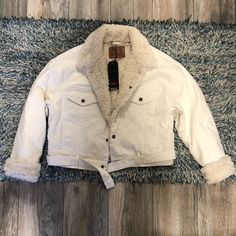 Beautiful Levi’s Cream Colored Sherpa Jacket Brand New With Tags Open To Offers Bundle To Save Levi Sherpa, Levi Sherpa Jacket, Levis Sherpa Jean Jacket, Levis Sherpa Jacket, Levi’s Sherpa Jacket, Trucker Jacket Men, Dark Wash Denim Jacket, Sherpa Outerwear With Double-lined Hood, Levis Denim Jacket