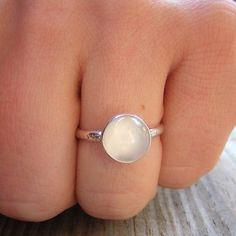 Natural Opaque Natural Moonstone Ring 10mm Round White Moonstone Cabochon 925 Argentium Silver Recycled and Eco Friendly Silver and conflict free gemstone Band width 2.25, Side profile Height depends on the height of the cabochon, but typically the stone is very low profile. Gemstone Solitaire Ring, Moonstone Ring Sterling Silver, White Moonstone, Silver Stacking Rings, Side Profile, Argentium Silver, Moonstone Jewelry, Moissanite Wedding Bands, Put A Ring On It