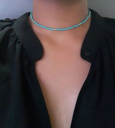 "Turquoise Choker - Seed Choker - Beaded Choker - Boho Choker - Dainty Stretch Choker - Green Turquoise Choker - Stretch Choker  * D E T A I L S * This choker is made with size 8 seed beads and is strung onto durable stretch cord. * S I Z E * It is avaliable in the following sizes: 11 inches  11.5 inches  12 inches  12.5 inches  13 inches  13.5 inches  14 inches Each choker comes with a 2\" extender chain.  * Q U E S T I O N S * If you have any questions, feel free to send me a message ❤" Cheap Blue Bohemian Choker, Colorful Beads Turquoise Necklace For Beach, Turquoise Beaded Necklaces For Festival, Turquoise Beaded Necklace For Festival, Turquoise Round Bead Jewelry For Beach, Turquoise Round Beads Jewelry For Beach, Beach Turquoise Necklace With Round Beads, Turquoise Tiny Beads Choker For Beach, Turquoise Beach Necklace With Round Spacer Beads