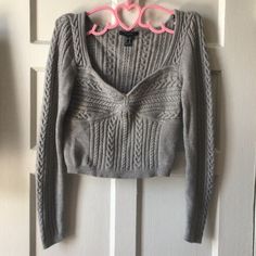 Never Worn! Super Cute Corset Style Cropped Sweater. I Love The Cable Knit Details Throughout. Style Cropped Sweater, Corset Sweater, Cute Corset, Rust Sweater, Oversized Grey Sweater, Off Shoulder Sweater, Bell Sleeve Sweater, Forever 21 Sweater, Boatneck Sweater