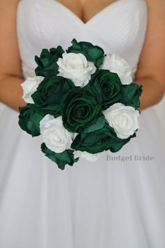 a bridal holding a bouquet of white and green flowers