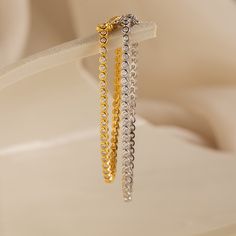 Your wedding day is a time for you to sparkle and be the center of attention. Accentuate your romantic ensemble with our Diamond Bezel Tennis Bracelet. Available in 3 lengths, this minimalist gemstone bracelet can be chosen based on the fit you need, making it an even more personalized bridal gift. Finish/Material: 18K Gold Over Brass ∙ Rhodium Over Brass Featuring ~3mm Bezels with ~2mm CZ Diamond Stones Part of our Diamond & Pavé Collection Model showcases a glamorous, statement look featuring Elegant Stackable Adjustable Tennis Bracelet, Elegant Adjustable Stackable Tennis Bracelet, Dainty Stackable Cubic Zirconia Bracelets, Elegant Stackable Adjustable Diamond Bracelet, Elegant Stackable White Gold Chain Bracelet, Elegant Adjustable Stackable Diamond Bracelet, Elegant Stackable Chain Bracelet For Formal Occasions, Elegant Formal Stackable Chain Bracelet, Elegant Bracelet With Delicate Cubic Zirconia Chain