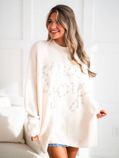 Spread joy with our Find Joy Embroidery Sweater! With its playful sewn-on letters, this sweater will keep you cozy and stylish. The mock neckline adds a touch of sophistication, while the side slits allow for easy movement. Take comfort in finding joy with this unique and fun sweater. Joy Embroidery, Fun Sweater, Embroidery Sweater, Find Joy, Mock Neckline, Cool Sweaters, Finding Joy, Free Giveaway, Sweaters & Cardigans