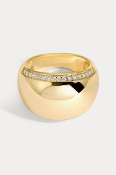 Bold and lightweight, this smooth domed design is embellished with pavé detailing along both edges of the ring.  Available in 14kt gold plated brass or Rhodium plated brass Stones are White Cz, and measure 1.0mm each Dome width measures approx. 15mm Dome height measures approx. 4mm Runs true to size    Product Care: ME Dome Rings Gold, Lili Claspe Jewelry, Birthday Wishes Flowers, Dome Ring, Casual Jewelry, Domed Ring, Jewelry Cleaner, 14kt Gold, Jewelry Pouch