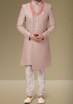 Ready-Made Sherwani With Trouser. Jacquard Brocade Fabric Top. Art Dupion Aligarhi Ready Made Trouser. Crafted in Chinese Collar Neck, and Full Sleeve. Satin Lining with Plain Work. High-Quality Matching Buttons. Please Note: The footwear shown in the picture is for presentation and photography purpose only. Color: There might be slight color variation due to lightings and flashes while photo shooting. The color may also vary because of different screen resolutions. Wash Care: Dry Clean Only. Simple Sherwani For Men, Indo Western Dress Party Wear, Indo Western Outfits For Men, Indian Menswear, Engagement Dress For Groom, Western Party Wear, Indo Western Sherwani, Party Dress Codes, Party Dress Inspiration