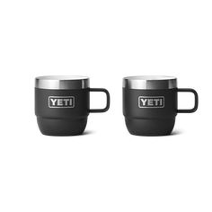 two black yeti mugs sitting next to each other on a white background with the words yeti in silver lettering