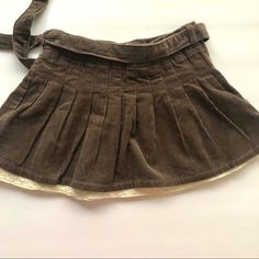 United Colors Of Benetton Brown Corduroy Short Skirt Baby Girl 12-18 Months Lined Baby Girl Lace Detail At Hem Zips On Side Belt Included Pleated Skirt Adjustable Waist Size 12-18 Months 100% Cotton **Barely Noticeable Hanger Indent At The Waistband (See Last Picture)** Like-New Condition/Never Worn Fall Pleated Skirt, Brown Corduroy Skirt, Easy Diy Clothes, Side Belt, Skirt With Lace, Brown Skirt, Corduroy Shorts, Brown Corduroy, Pleated Skirts