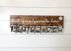 a wooden sign that says best grandparents son with photos hanging from it's sides