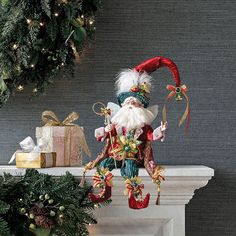 a christmas decoration on top of a mantel