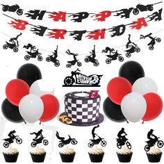 a birthday party with cupcakes, balloons and cake toppers for a biker theme