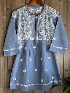 Unique denim look Chikankari hand embroidered a line blouse. Length: 30 inches A Line Blouse, Kurta Cotton, Chikankari Kurti, Neck Designs For Suits, Short A, Cotton Blouse, Hand Embroidery Designs, Blouse Length, Cotton Blouses