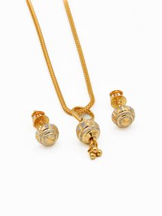 Crafted with precision and elegance, this 22ct Gold Two Tone Ball Pendant Earring Set is a timeless accessory. Weighing 3.27 grams, it effortlessly combines classic gold with a modern touch. Purity: 22ct gold Chain not included. Dual-tone Yellow Gold Round Jewelry, 22k Gold Round Hallmarked Jewelry Sets, Hallmarked 22k Gold Round Jewelry Sets, Dual-tone Yellow Gold Jewelry For Formal Occasions, Formal Dual-tone Yellow Gold Jewelry, Classic Hand-set Gold Jewelry Sets, Classic Gold Jewelry Sets, Classic Gold Jewelry Set With Matching Earrings, Classic Gold Jewelry Sets With Diamond Cut