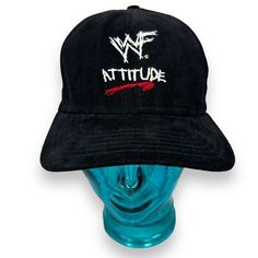 a black hat with the word attitude on it