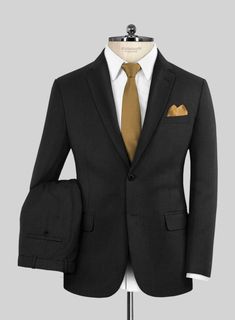 When it's about formality, the black suit reigns supreme. Crafted from wool blend, our Stretch Black Wool suit boasts plenty of charm and sophistication that you can flaunt at any formal or important event. Style it up with a matching waistcoat, white shirt, gray tie and polished shoes.  Look Includes   Stretch Black Wool Fabric  Two Button Jacket Style  Notch Lapel  Horn Royal Black Buttons  Single Vent  Three Cuff Buttons  Two Welted Back Pockets on Trousers    Click 'Customize Now' to modify the look if needed.   Lining: Viscose, Dry Clean. Black Wool Fabric, Grey Tie, Button Jacket, Black Suit, Wool Suit, Black Suits, Jacket Buttons, Black Button, Wool Fabric