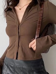 Style: Casual. Street Color: Black.Brown.Khaki Fabric Content: Polyester Blend Fit Type: Slim fit Neckline: Polo Neck Sleeve Length: Long Sleeve Design: Front Button Fastening. Flare Cuffs    SIZE US UK EU BUST (Inches) Shoulder Length (Inches) Sleeve Length (Inches) Body Length (Inches)   S 4 8 36 29.92 13.78 25.2 19.69   M 6 10 38 31.5 14.17 25.59 20.08   L 8 12 40 33.07 14.57 25.98 20.47 Jeans Outfit Summer, Generation Z, Crop Top Dress, Bodycon Floral Dress, Summer Jeans, Polo Neck, Vintage Polo, Crop Top Blouse, Collar Blouse