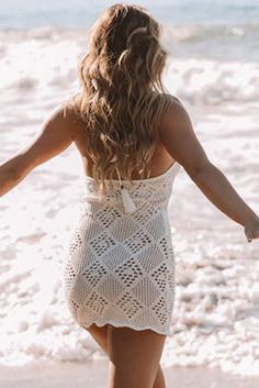 White Hollowed Crochet Tassel Halter Sleeveless Beach Dress Sleeveless Beach Dress For Beach Wedding, Sleeveless Crochet Dress For Beach Party Vacation, Sleeveless Beach Dress For Beach Wedding Vacation, Beachy Sleeveless Crochet Dress For Vacation, Beachy Sleeveless Crochet Dress For Beach, Bohemian Sleeveless Crochet Dress For Vacation, Sleeveless Fringe Crochet Dress For Beach, Sleeveless Crochet Fringe Dress For Beach, Beach Crochet Dress With Spaghetti Straps