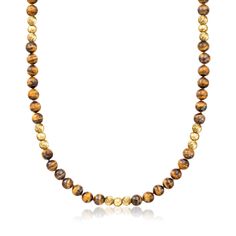 Ross-Simons - C. 1980 Vintage 10mm Tiger Eye Bead Necklace, 14kt Yellow Gold. 30". C. 1980. Brimming with the unmistakable yellow-brown shade of tiger eye, this Estate collection necklace will attract the best kind of attention! Groups of 10mm round tiger eye beads alternate with trios of 14kt yellow gold beads, for a rich and unique glow. Suspending at an ample 30", our necklace is a standout in every way. Fishhook clasp, tiger eye bead necklace. Exclusive, one-of-a-kind Estate Jewelry. Classic Gold Hand-strung Necklace, Yellow Gold Necklaces With 8mm Beads, Yellow Gold Necklaces With 8mm Round Beads, Yellow Gold Beaded Necklace With 8mm Round Beads, Classic Gold Necklace With 8mm Beads, Spiritual Yellow Gold Necklaces With Round Beads, Gold Rondelle Hand-strung Necklaces, Yellow Gold Hand-strung Beaded Necklaces, Hand-strung Yellow Gold Beaded Necklaces