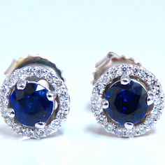 Cluster Halo Prime. .92 Carat Natural Round Sapphires. Royal Blue, Clean Clarity And Transparent. Diameter 4.3 Mm Each. .26ct Natural Round Diamonds. G Color Vs2 Clarity 14kt White Gold 1.8 Grams. Blue Sapphire Diamond Earrings With Brilliant Cut, Gia Certified Sapphire Diamond Earrings, Blue Diamond Round Earrings For Wedding, Blue Diamond Earrings With Halo Design For Anniversary, Blue Diamond Earrings For Anniversary, Blue Diamond Earrings For Wedding, Blue Brilliant Cut Diamond Earrings For Formal Events, Blue Round Diamond Earrings Fine Jewelry, Blue Brilliant Cut Diamond Earrings