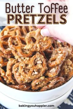 a bowl filled with butter toffee pretzels on top of a table